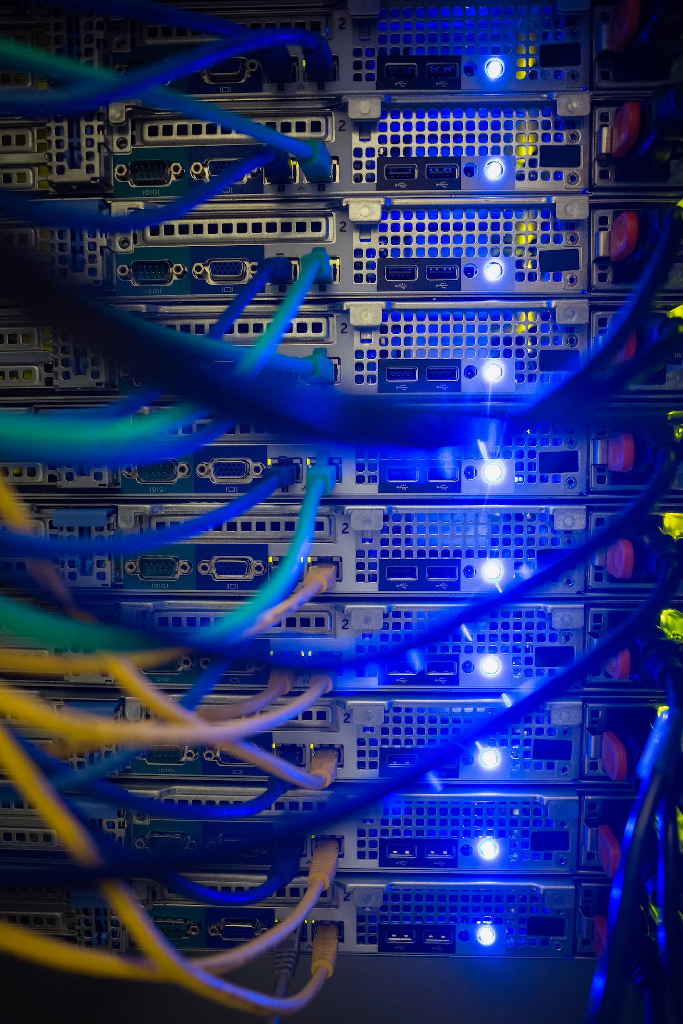 Interior of server with wires blue close up in data center